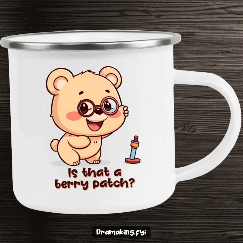 Funny camping mug with a bear cub wearing a monocle, pointing excitedly at a distant object, ready for outdoor discovery.