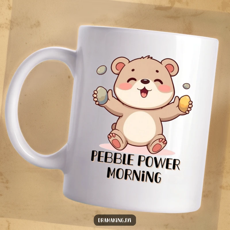 Funny mug featuring a cheerful bear cub character skillfully juggling three shiny pebbles with excitement, perfect for nature lovers.