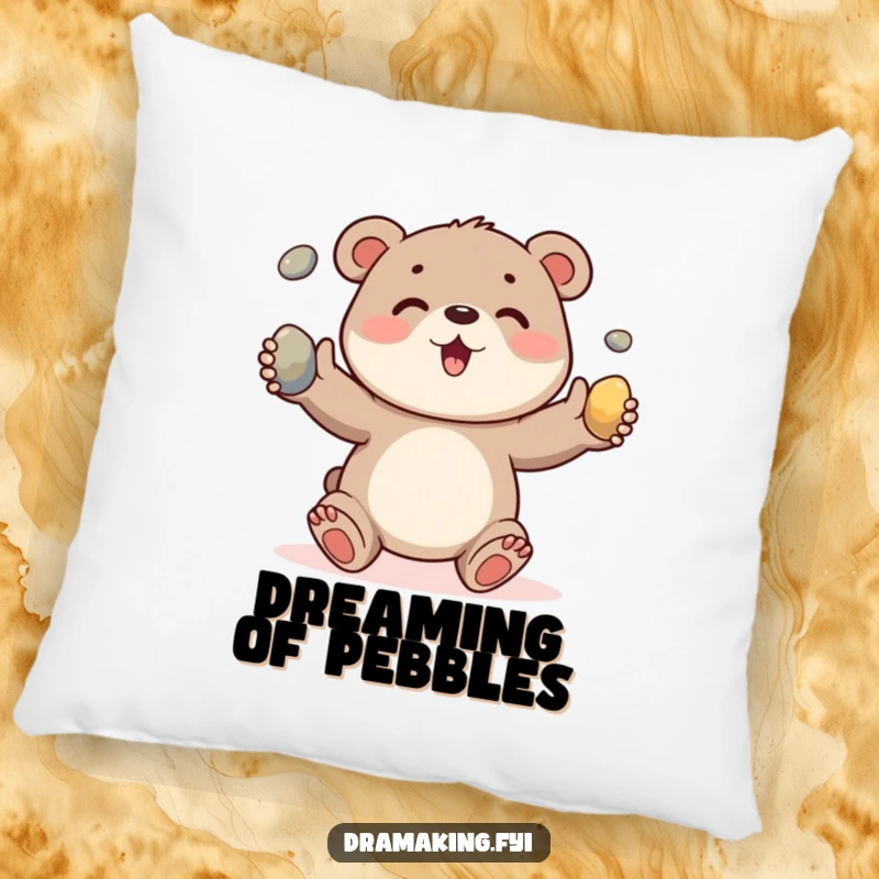 Funny pillow featuring a happy bear cub juggling three shiny pebbles, offering comfort with a cheerful animal theme.