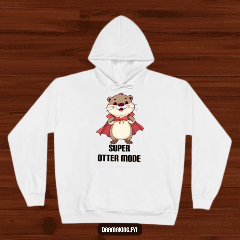 Funny Otter Hero Hoodie featuring a cheerful otter in a cape striking a flamboyant, confident pose, perfect for funny, cozy heroism.