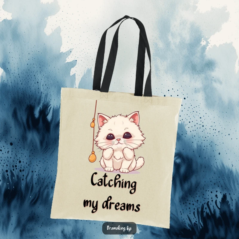 Funny cat tote bag with a fluffy cat dramatically batting a dangling string, its lips pursed in hilarious concentration, ready for shopping.