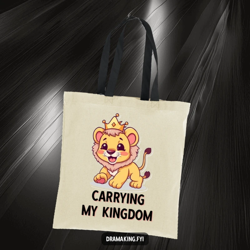 Funny tote bag depicting a lion cub wearing a crown, playfully pouncing, perfect for carrying essentials with majestic charm.