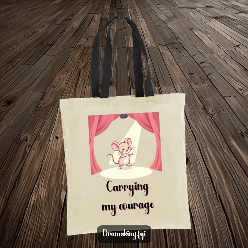 Funny tote bag with a timid mouse tiptoeing across a stage under a shining spotlight, a humorous and relatable accessory.